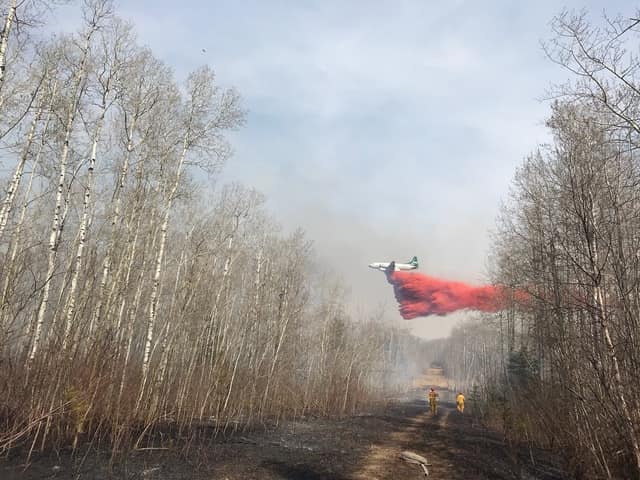 Crews contain wildfire near Christopher Lake