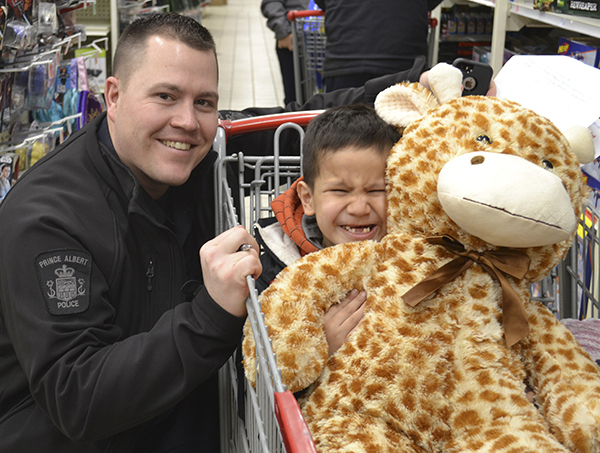 Police help children in need shop for family Christmas gifts