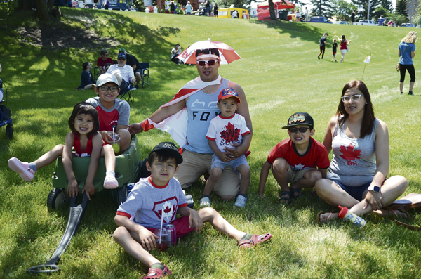 Canada Day on the riverbank showcasing cultural performances, fireworks display