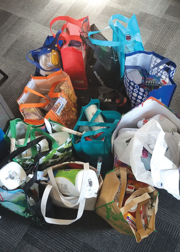 Settlement Services thanks community for donations for newcomers