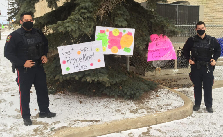 Anonymous supporters post get well messages outside of police station
