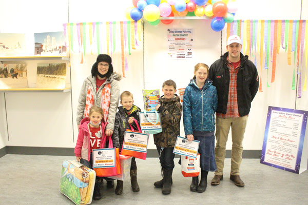 Family of winners in Winter Festival Poster Contest