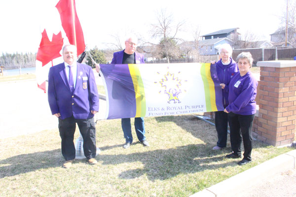Elks and Royal Purple Elks raise awareness of Speech and Hearing Month with flag raising
