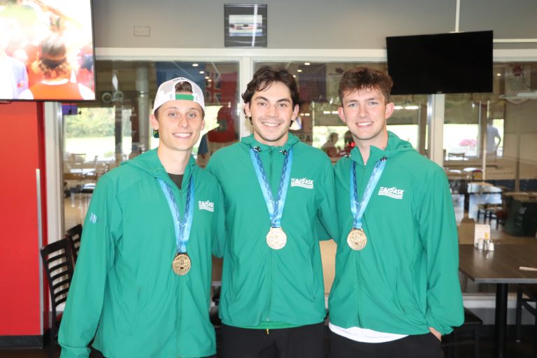 Team Sask Men’s Volleyball players celebrate gold medals