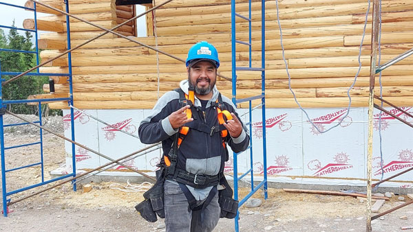 Housing program in Southend builds tiny log cabins to benefit community