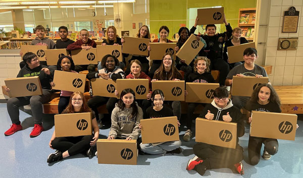 Catholic Division partnership with ComKids delivers laptops to Grade 7 students