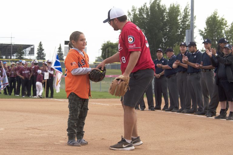 Prince Albert officially welcomes top U15 Boy’s Softball teams, honours former player and umpire Victor Thunderchild at opening ceremonies