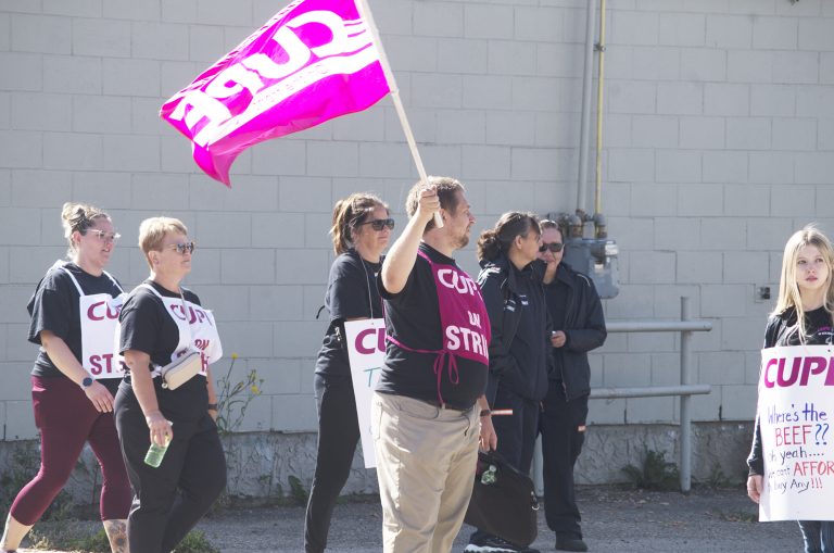 City promises ‘business as usual’ as inside workers hit the picket line
