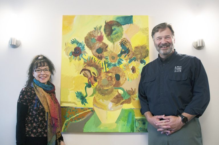 More than 100 local art students collaborate on Rose Garden Hospice painting donation