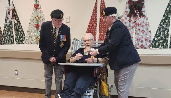 Longtime Legion member Miller presented with 65 Year pin