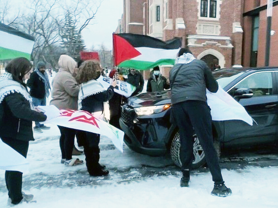 Police step in after protestors block federal minister’s vehicle in Regina