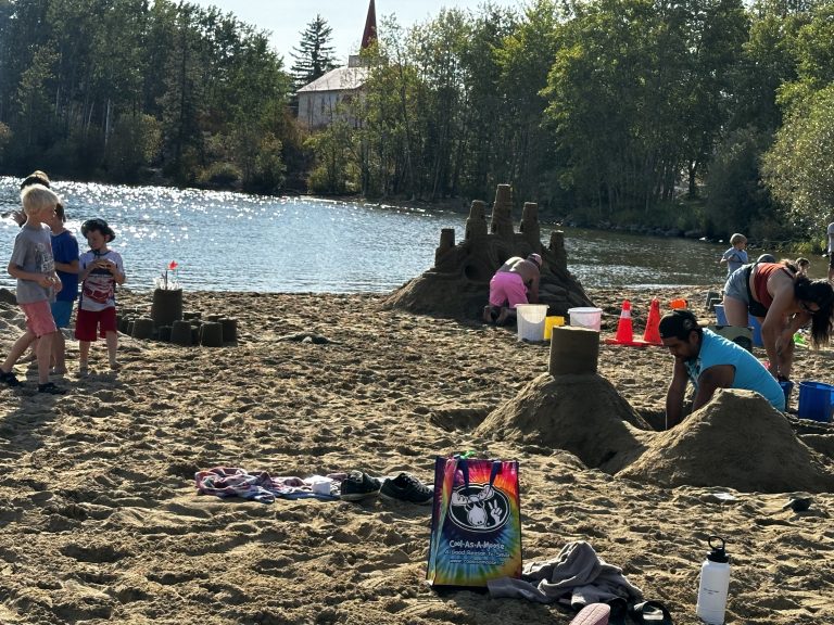 Kids of all ages frolic in the sand